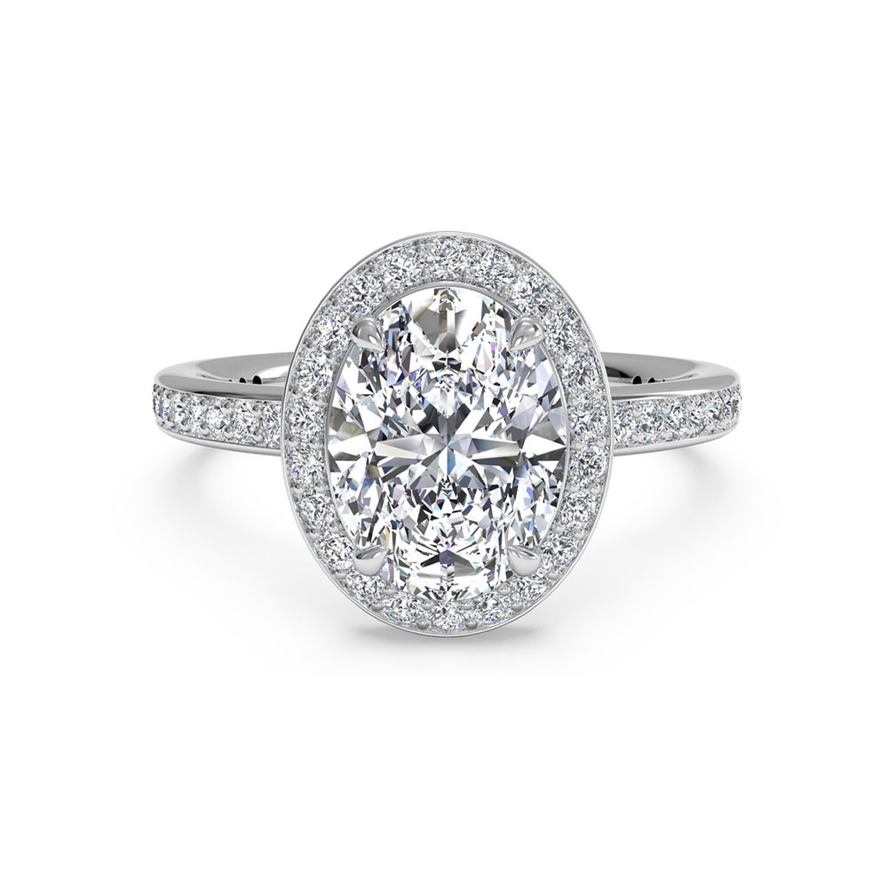 Oval Cut engagement ring with a daimond halo and diamond band