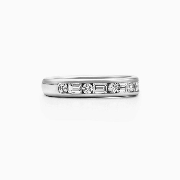 Round And Baguette Diamond Engagement Channel Ring