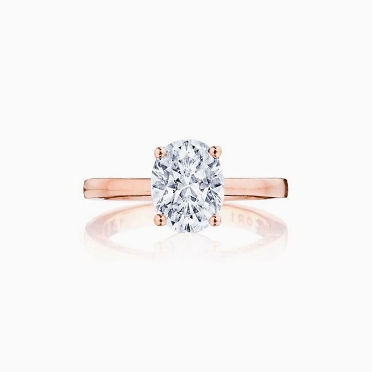 Oval Cut diamond engagement ring on a plain band