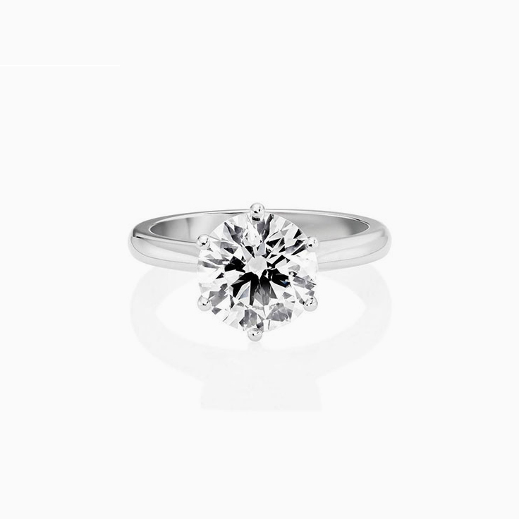 Round Brilliant Cut Engagement Ring In A Six Claw Setting