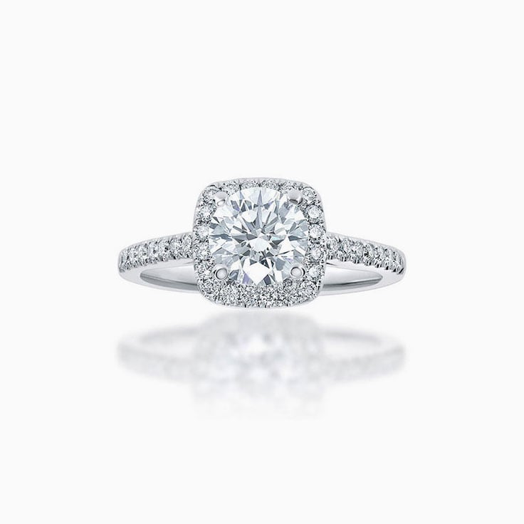 Round Brilliant cut cushion halo engagement ring