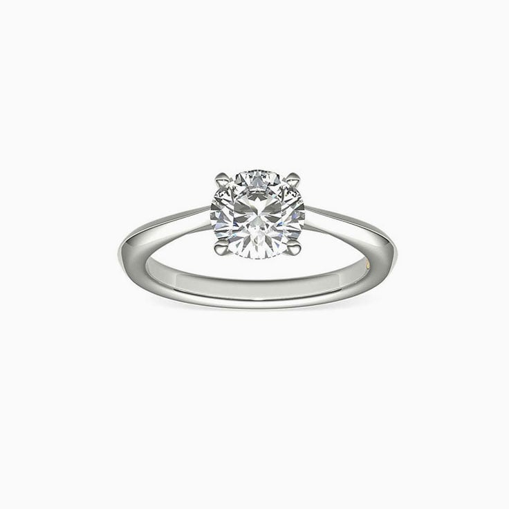Round brilliant cut diamond on knife edge band enagement ring