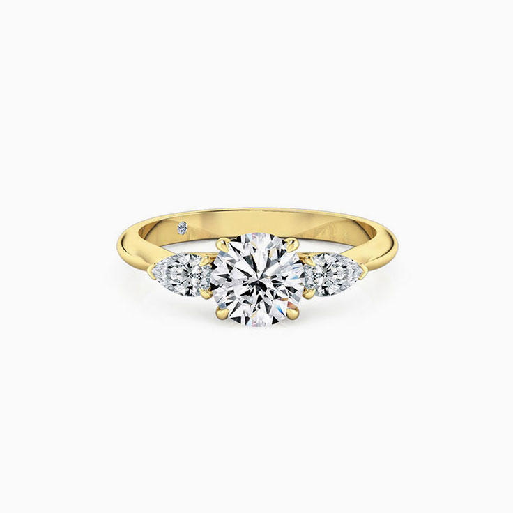 Round Diamond With Side Pear Cut Engagement Ring