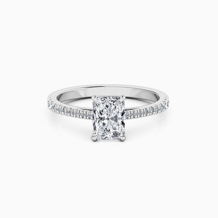 Radiant cut diamond engagement ring on a diamond band