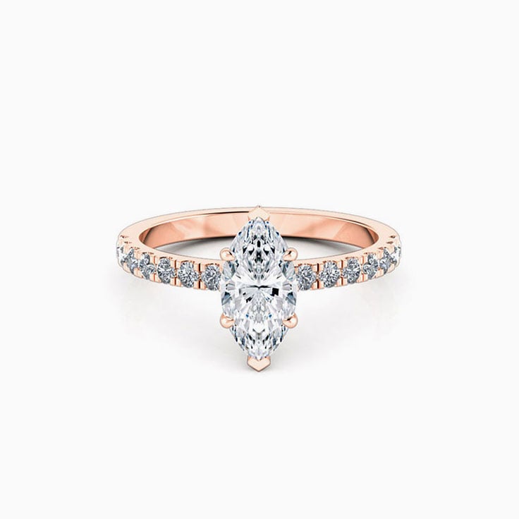 Marquise cut diamond engagement ring with diamond band