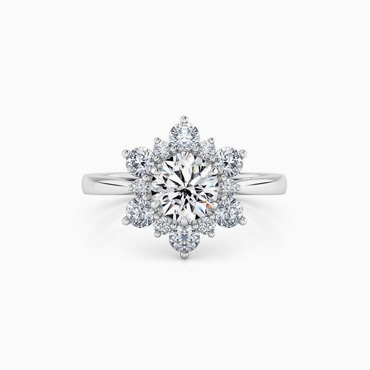 Round Brilliant Cut Engagement Ring With a Floral diamond Halo