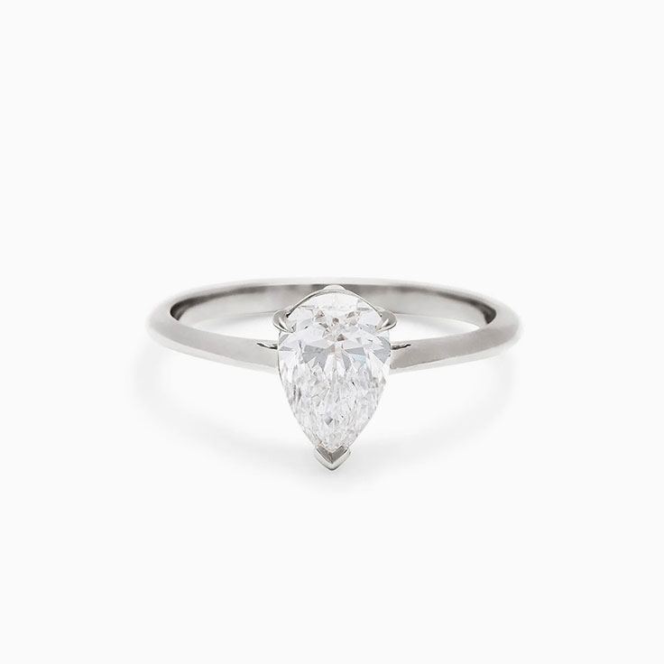 Pear cut solitaire engagement ring
