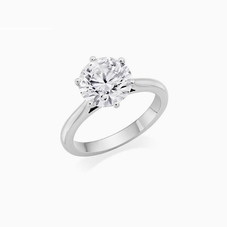 Round Brilliant Cut Engagement Ring In A Six Claw Setting
