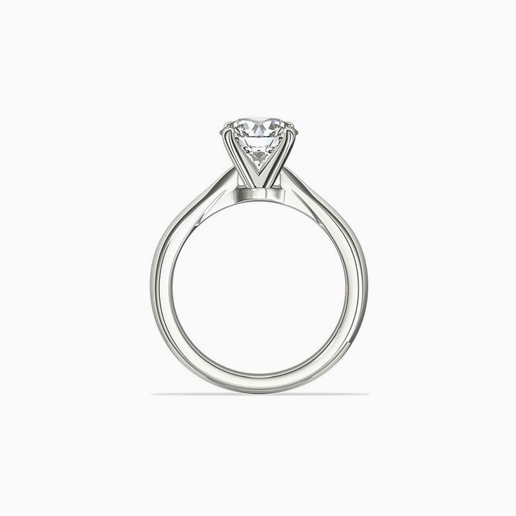Round brilliant cut diamond on knife edge band enagement ring