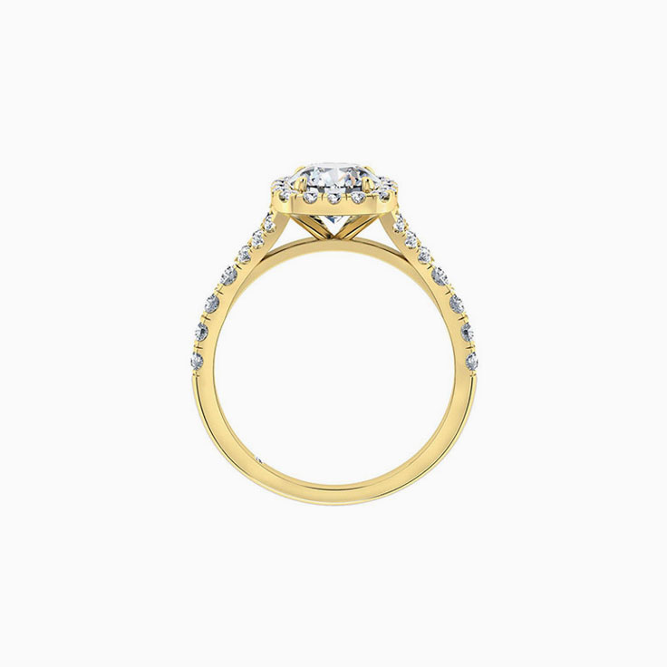 Round brilliant with a cushion halo engagement ring