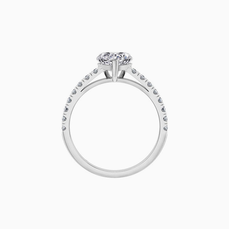 Heart shape diamond engagement ring on a diamond band