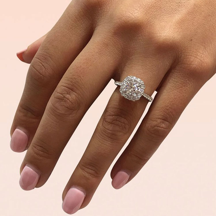 Round Diamond with a cushion halo ring