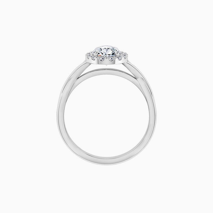 Pear cut engagement ring on a twisted plain band