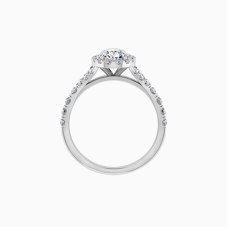 Pear cut daimond with halo and spilt diamond band