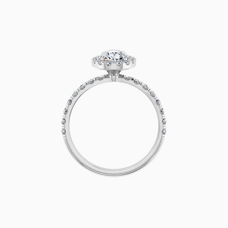 Pear cut diamond engagement ring with halo